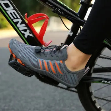 Barfotsko designet for både menn og kvinner, som gir en naturlig følelse av bakken under føttene, perfekt for løping og hverdagsbruk.