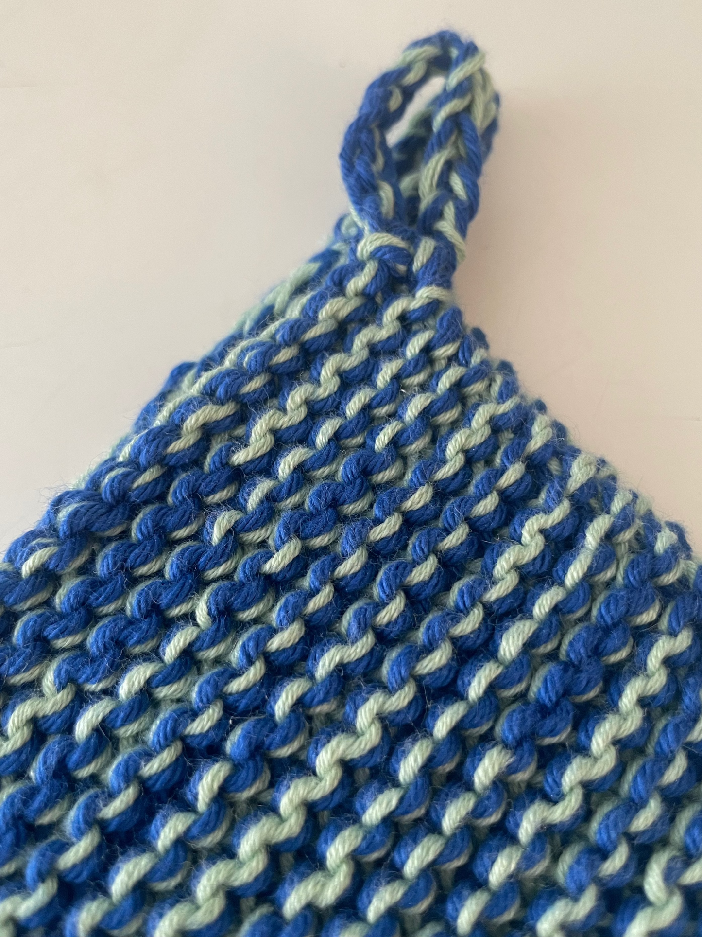 Knitted potholders with braided handles