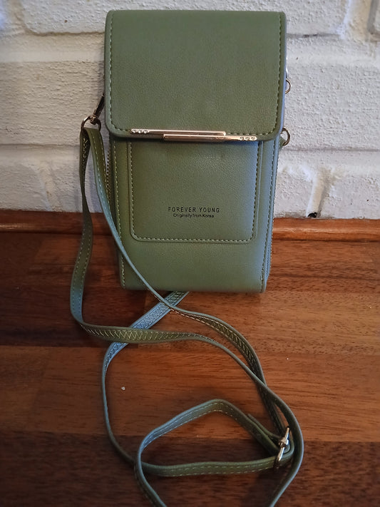 Elegant håndveske i militærgrønn farge, perfekt for å oppbevare telefon og andre småting. Stilfullt design som passer til både hverdagsbruk og spesielle anledninger.