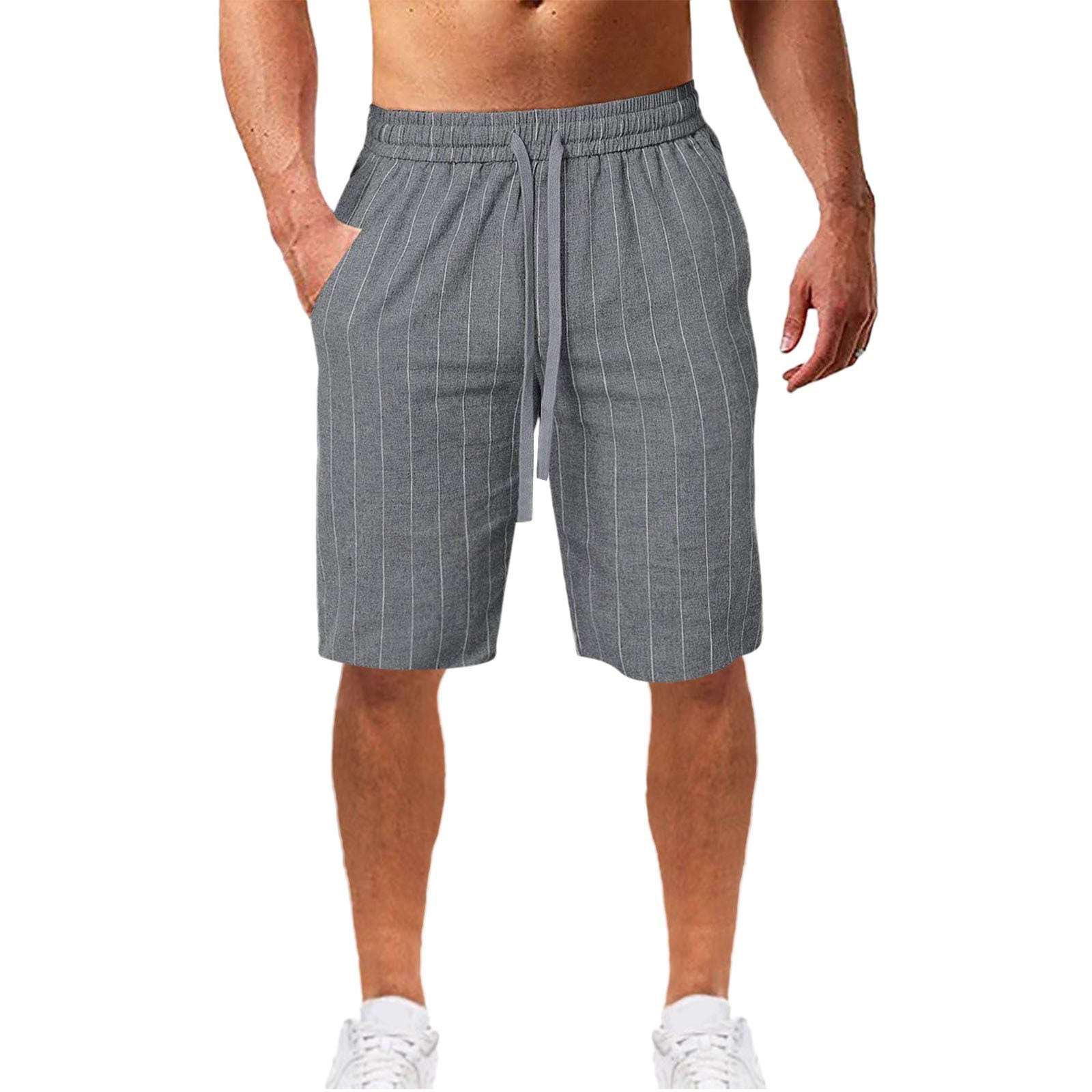 Stripete grå herreshorts med snøring og elastisk midje, ideelle for komfort og stil. Designet i myk og lett materiale, perfekt for varme dager. Shortsene har en moderne stripemønster med en justerbar snøring for optimal passform. Passer godt til både avslappede og sporty anledninger.