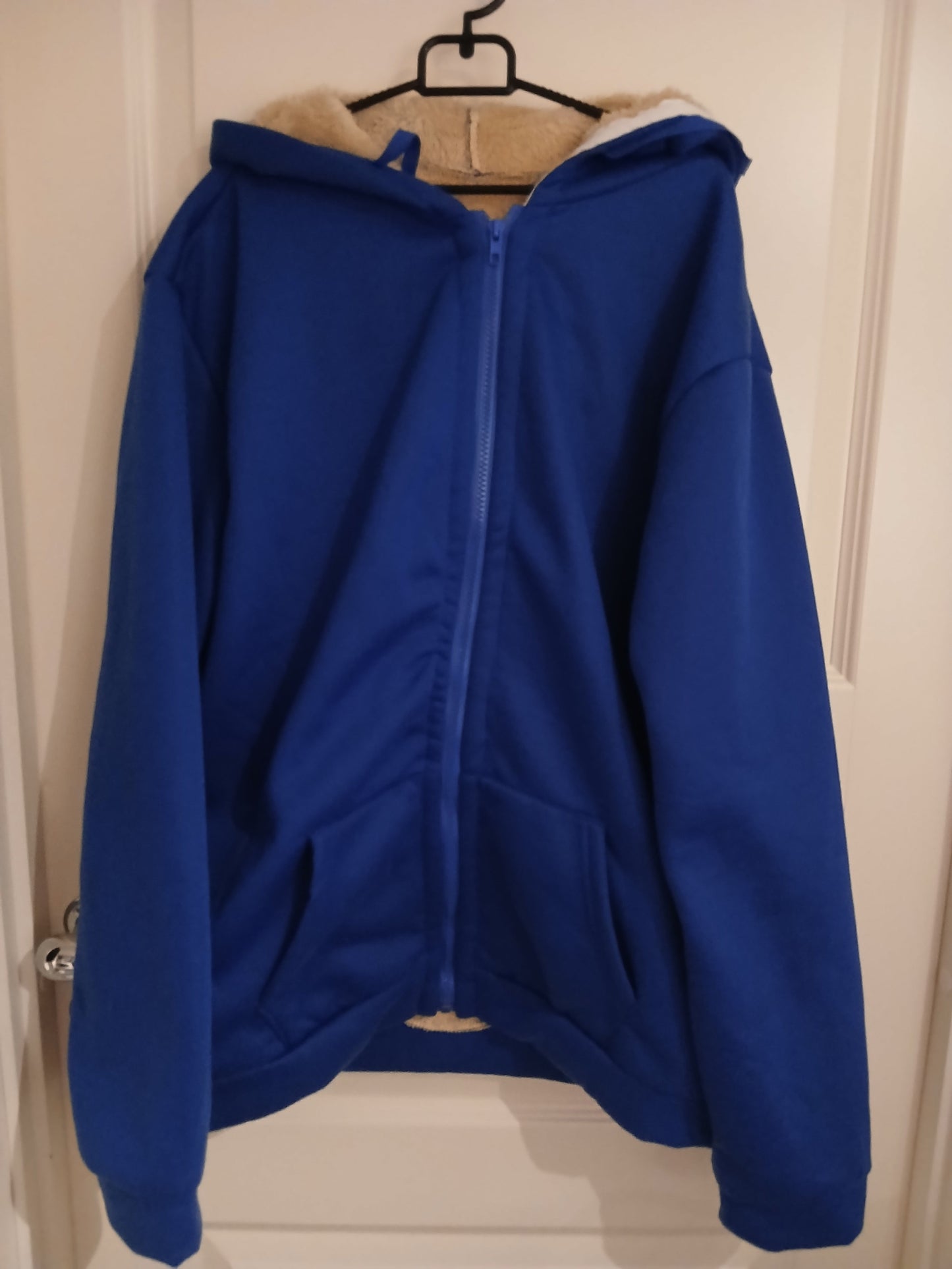 Jakke med fleecefôr og hette Unike turprodukter